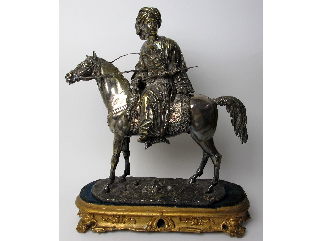 Appraisal: An electroplated metal model of a Turkish military horseman on