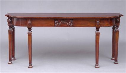 Appraisal: GEORGE III-STYLE CARVED AND INLAID MAHOGANY CONSOLE TABLE The cross-banded