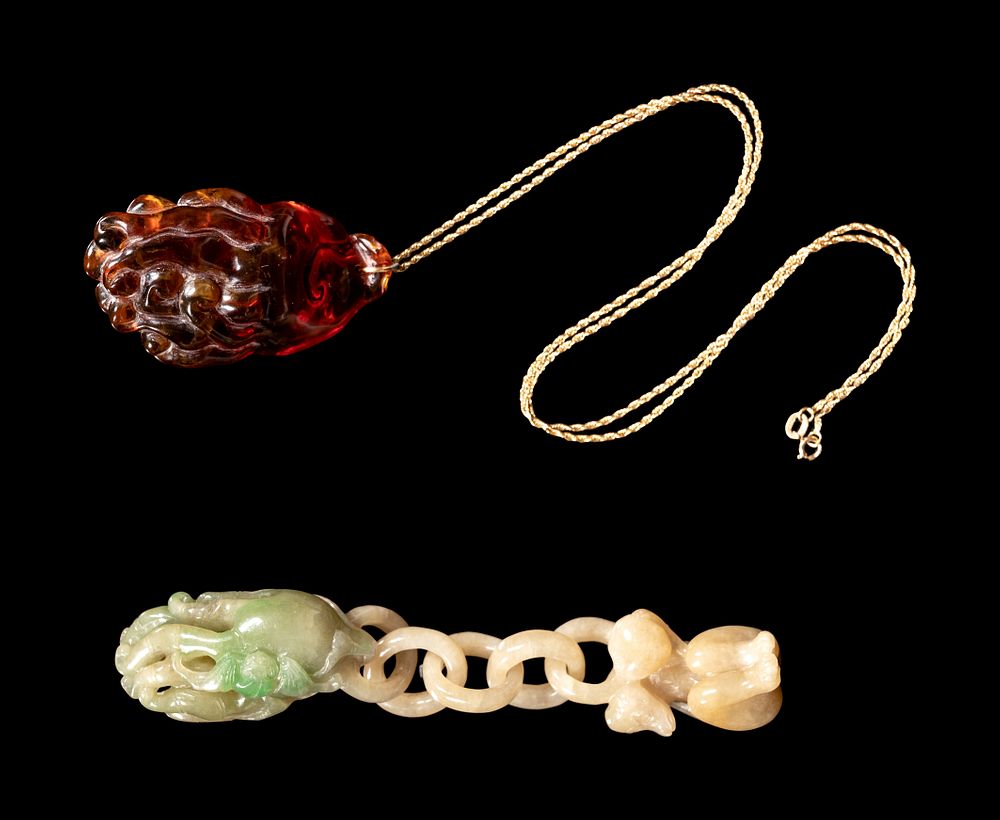 Appraisal: Two Chinese Precious Stone Buddha's Hand Citron-Form Pendants Two Chinese