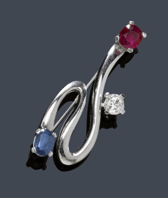 Appraisal: A BURMA RUBY SAPPHIRE AND DIAMOND BROOCH-PENDANT White gold Decorative