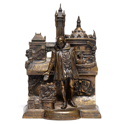 Appraisal: A brass statuette of William Shakespeare standing before the burning