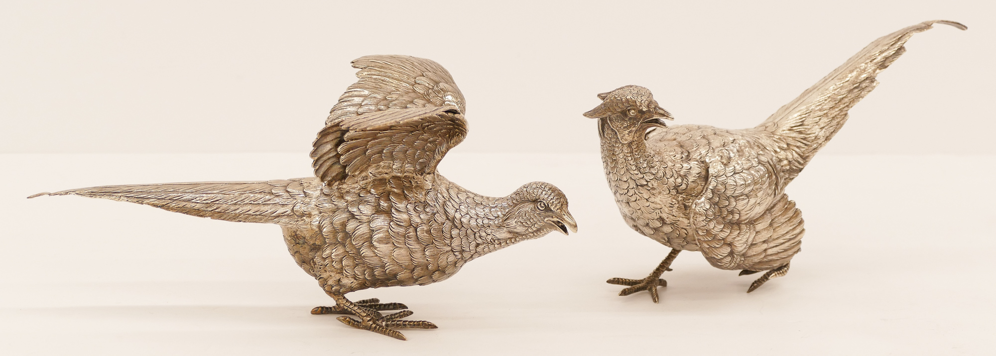 Appraisal: Pair Continental Silver Table Pheasants ''x '' Approx A pair