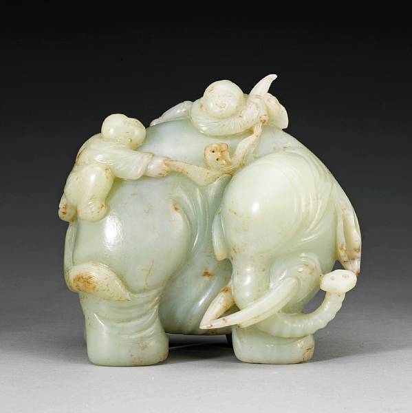 Appraisal: A nephrite carving of an elephant and boys Vividly depicting