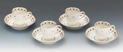 Appraisal: Four British Coffee Cups and Saucers Four matching hard paste