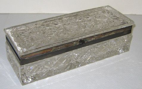 Appraisal: CUT GLASS SILVER MOUNTED DRESSER BOX Long footed box with