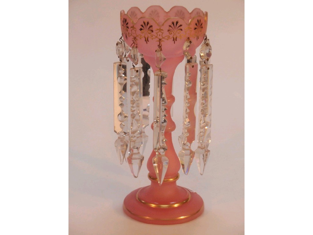 Appraisal: A Victorian pink glass table lustre with gilt decoration and