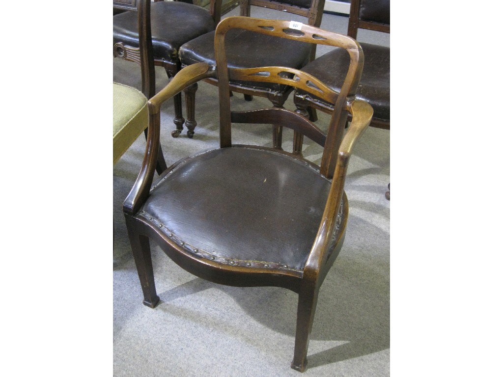 Appraisal: Mahogany and leather upholstered open armchair