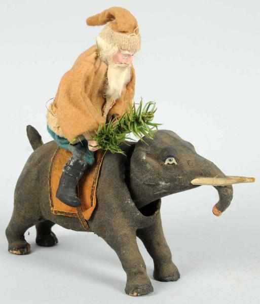 Appraisal: Santa Riding Elephant Nodder Composition face and hands Head and