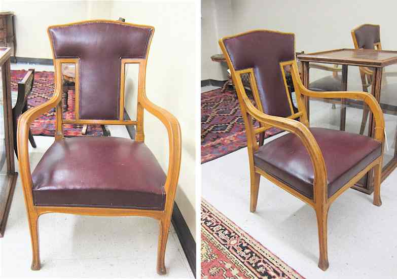 Appraisal: PAIR OF OAK AND BURGUNDY LEATHER ARMCHAIRS Continental early th