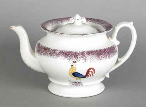 Appraisal: Purple spatter teapot with a rooster th c h Provenance