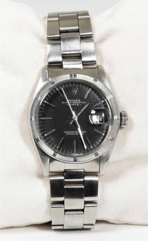 Appraisal: GENTLEMAN'S WRISTWATCH ROLEX DATE s Steel Ref Tonneau-shaped case No