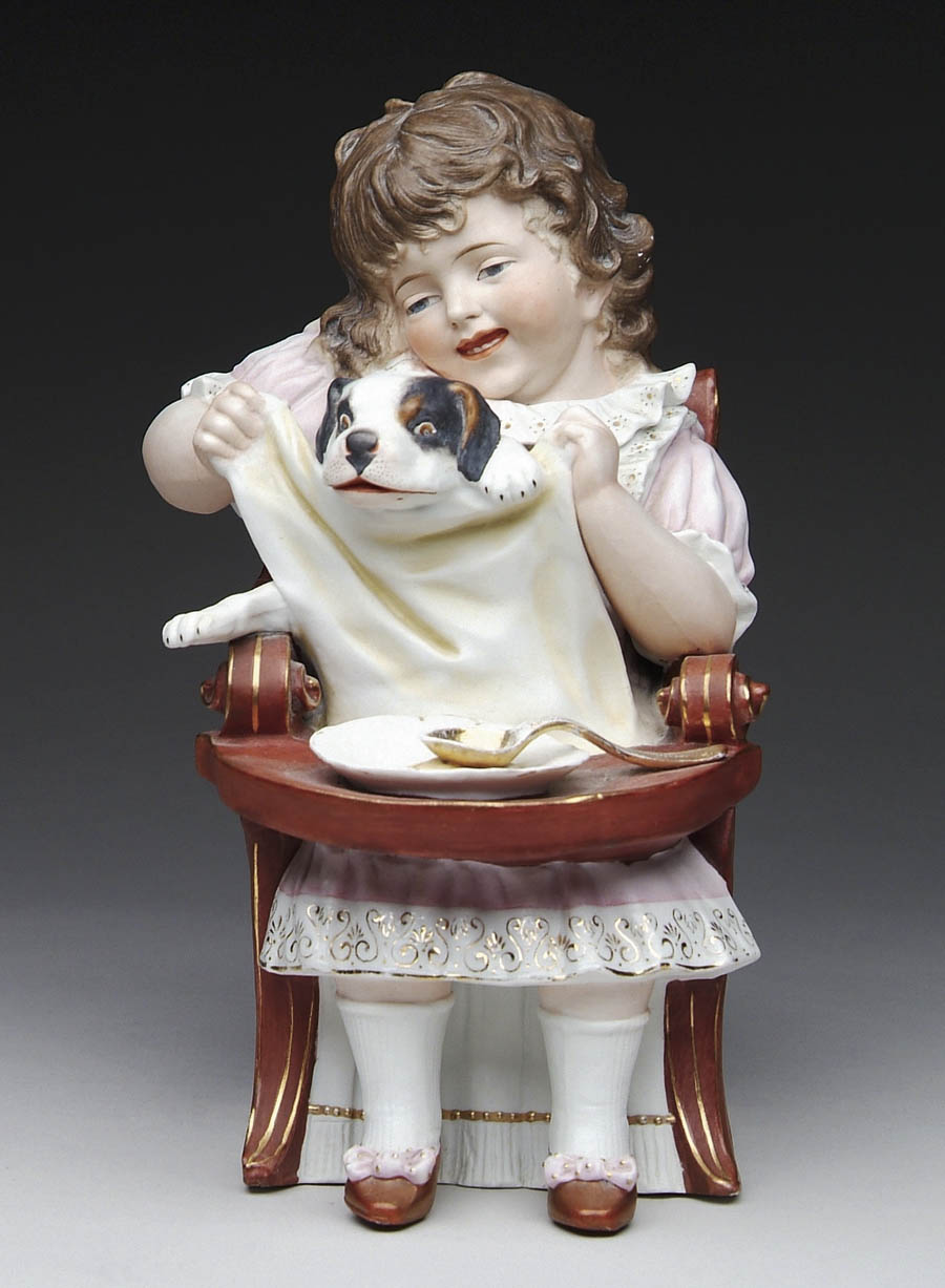 Appraisal: DECORATED BISQUE FIGURE OF A GIRL AND HER DOG IN