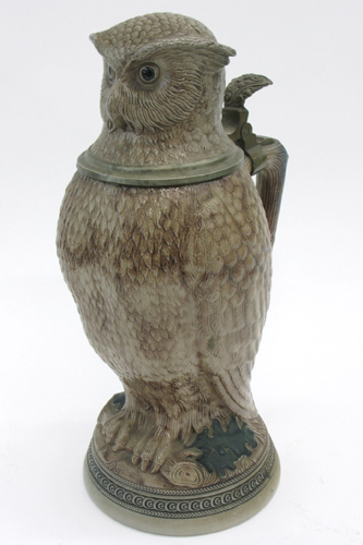 Appraisal: A GERMAN LITER FIGURAL BEER STEIN in the form of