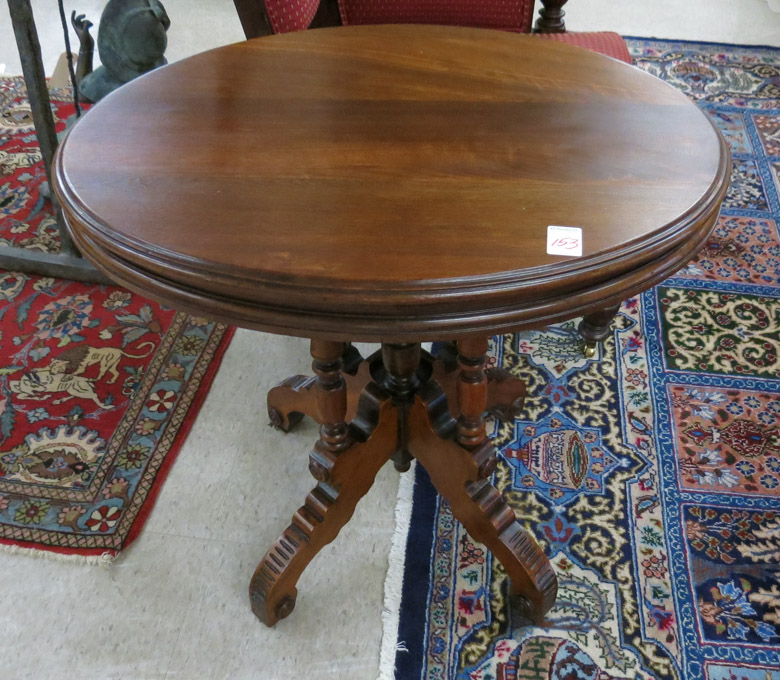 Appraisal: A VICTORIAN WALNUT LAMP TABLE American late th century having