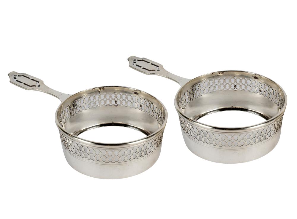 Appraisal: PAIR OF TIFFANY CO STERLING RAMEKIN HOLDERS - pattern number