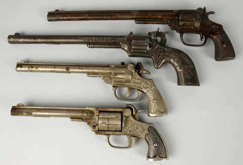 Appraisal: Lot of Cast Iron Cap Pistol Toys Description American All