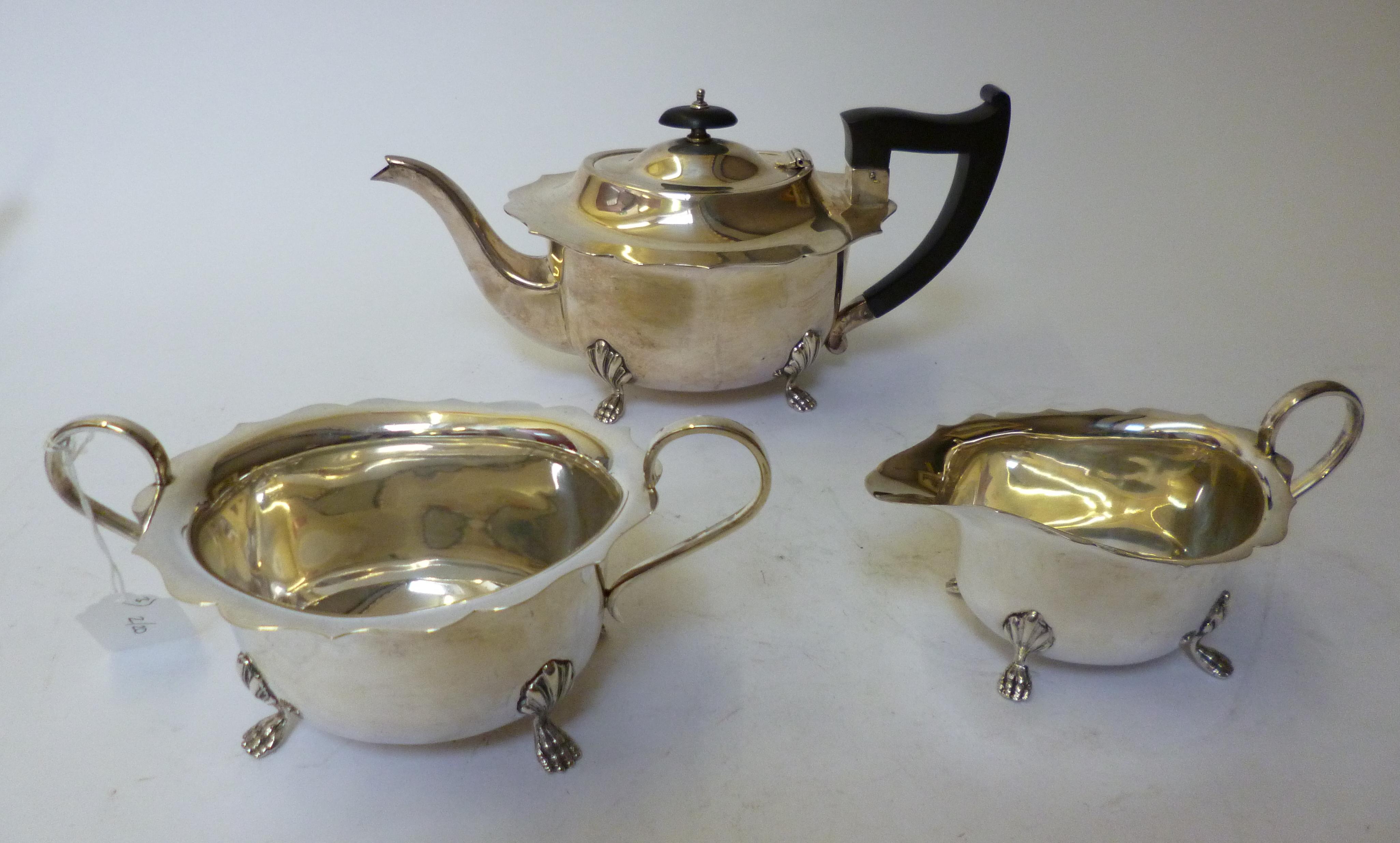 Appraisal: A THREE PIECE TEA SERVICE maker Viners Sheffield of plain