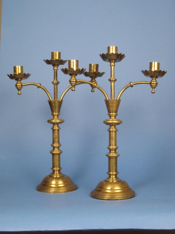 Appraisal: Pair of Arts and Crafts brass two-branch Candelabra with knopped