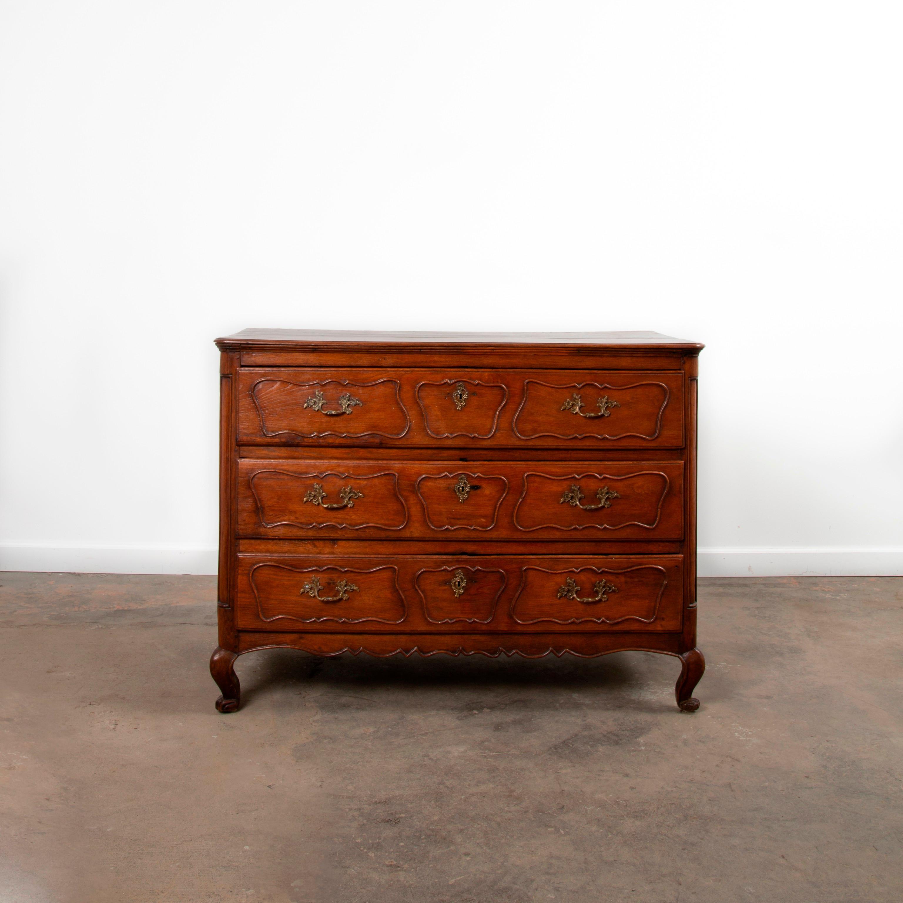 Appraisal: ANTIQUE FRENCH OAK COMMODE A three-drawer oak commode French circa