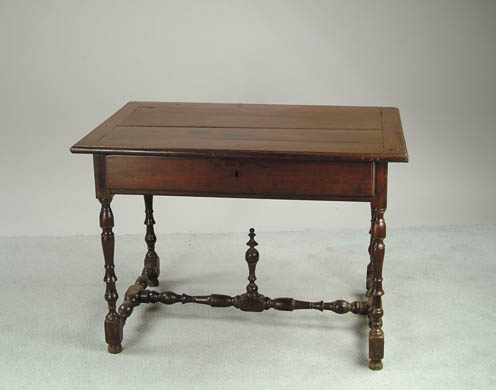 Appraisal: CONTINENTAL BAROQUE WALNUT SIDE TABLE Late th Century Tavern table