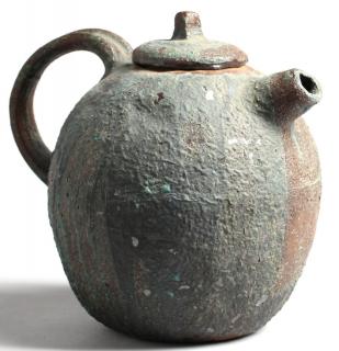 Appraisal: Studio Art Pottery Glazed Teapot The rough pebbly surface covered