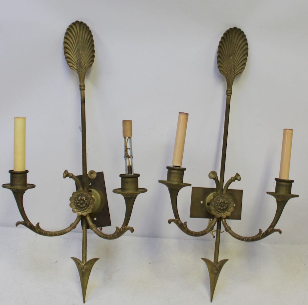 Appraisal: An Antique Pair of Bronze Arrow Form Sconces A great