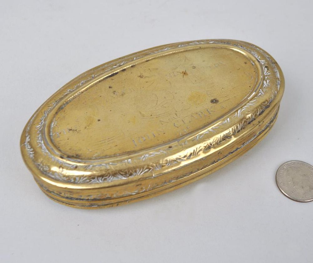 Appraisal: th Century Engraved Oval Brass Tobacco Box inscribed John Clark