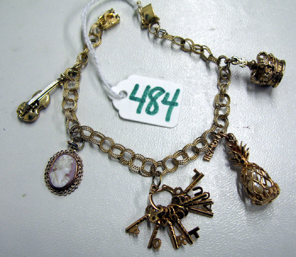 Appraisal: FOURTEEN KARAT GOLD CHARM BRACELET - inches in length with