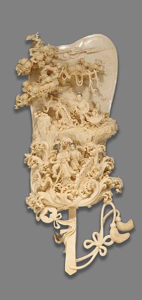 Appraisal: A carved and tinted ivory pictorial fan plaque th Century