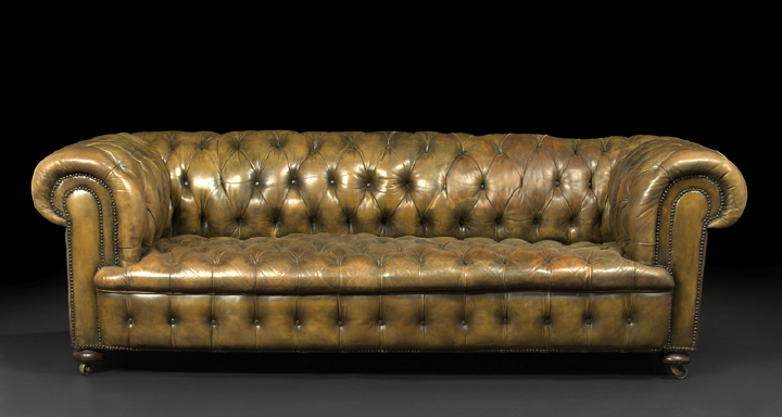 Appraisal: Edwardian Mahogany and Leather-Upholstered Chesterfield Sofa ca the padded and