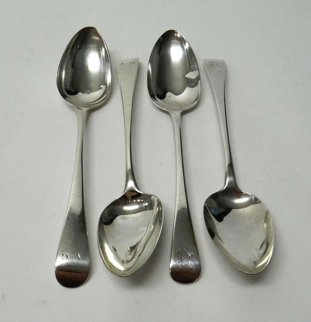 Appraisal: Two pairs of George III silver Old English pattern tablespoons