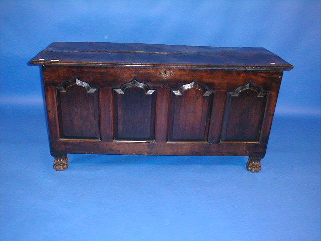 Appraisal: A thC oak coffer with plain moulded single plank top