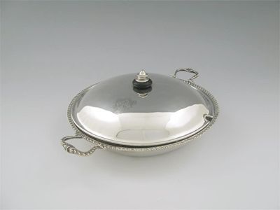 Appraisal: A George III circular chaffing dish and cover with gadrooned