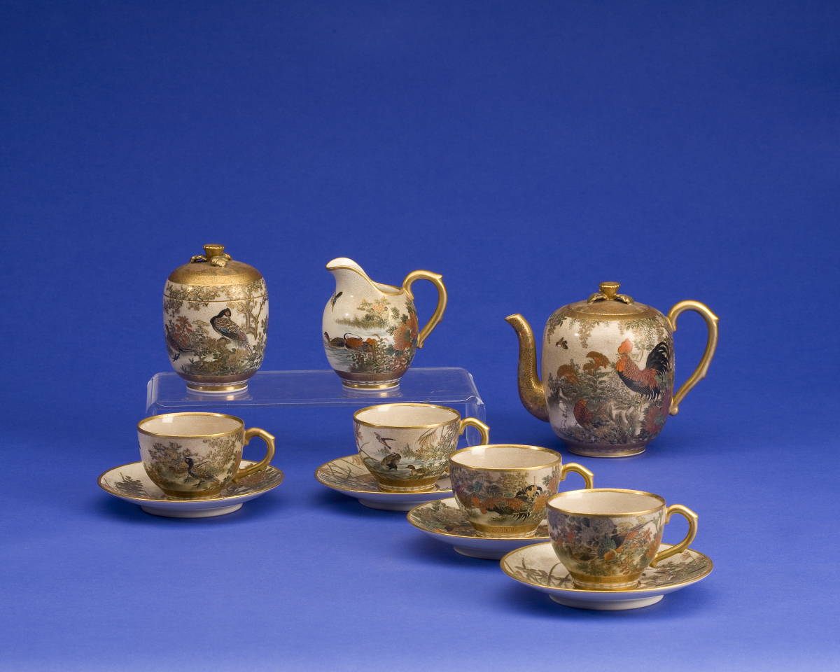 Appraisal: JAPANESE SATSUMA TEA SET WITH ELABORATE DECORATION OF ROOSTERS IN