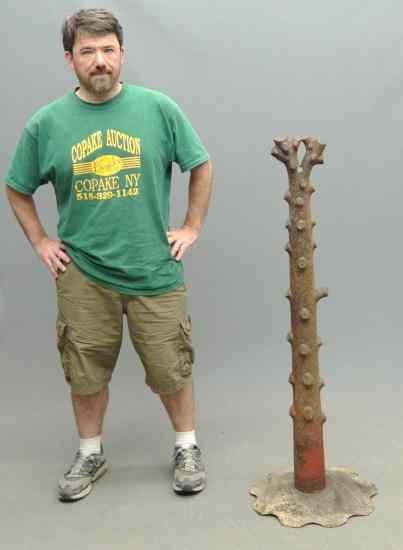 Appraisal: Scarce stump form iron hitching post in red paint ''