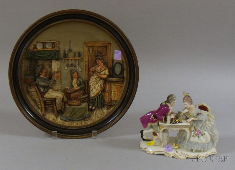 Appraisal: German Molded Pottery Genre Scene Plaque and a Dresden-style Porcelain