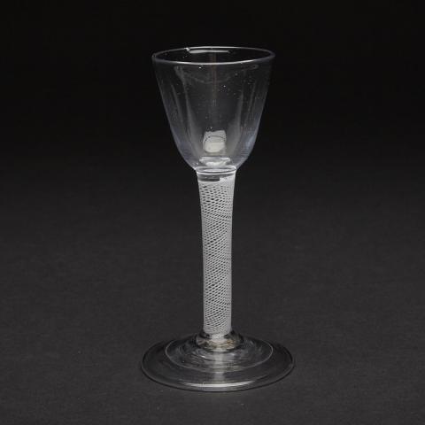 Appraisal: English Opaque Twist Stemmed Wine Glass th century with folded