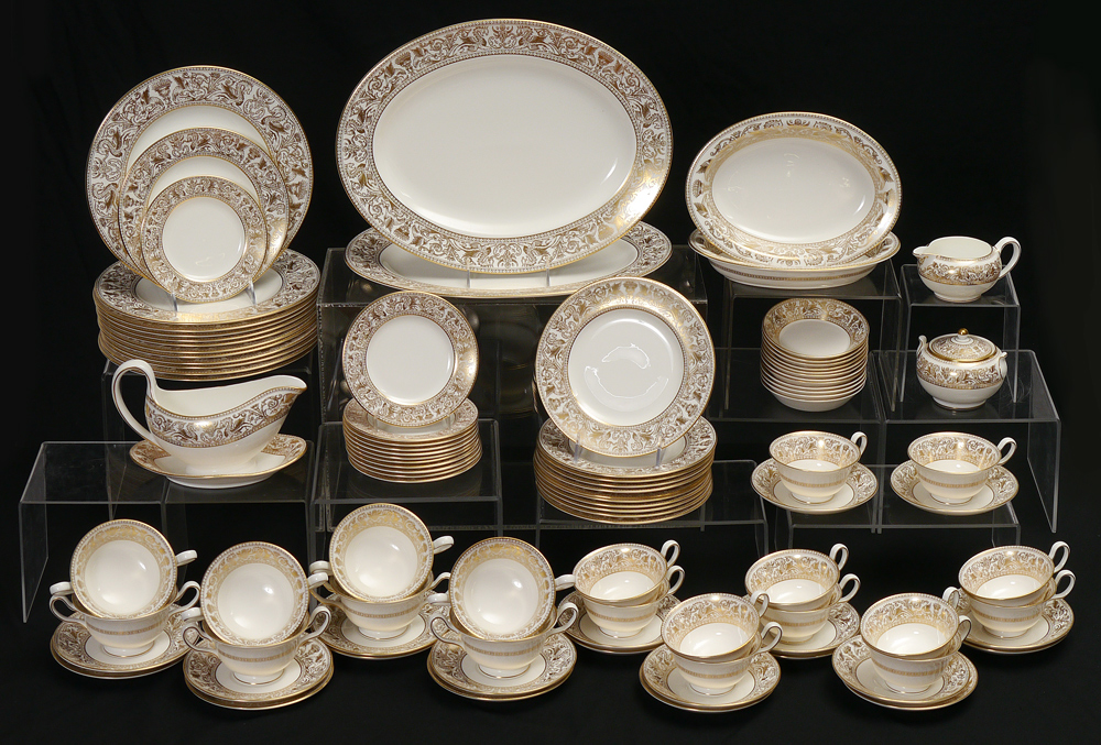 Appraisal: WEDGWOOD GOLD ''FLORENTINE'' CHINA An elegant dinner service with a