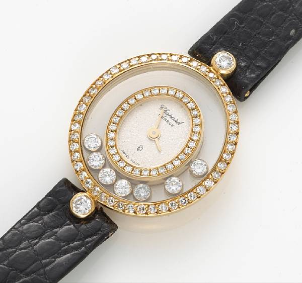 Appraisal: A lady's quartz diamond wristwatch with black strap Chopard Happy