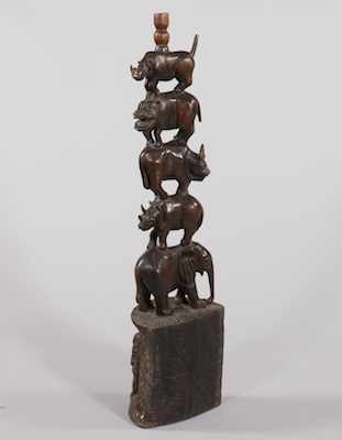 Appraisal: A Carved Wood African Sculpture Dark brown wood hand carved