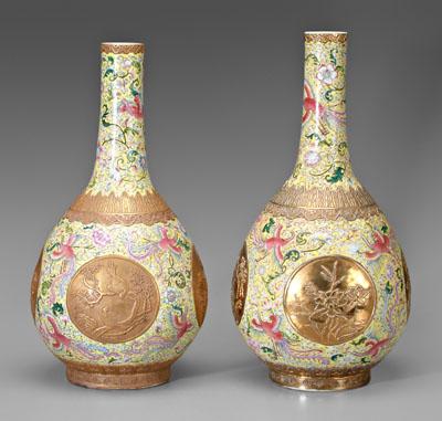 Appraisal: Pair Chinese famille rose bottle vases flowering vines and phoenixes