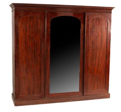 Appraisal: A Victorian mahogany wardrobe the moulded cornice over two arched