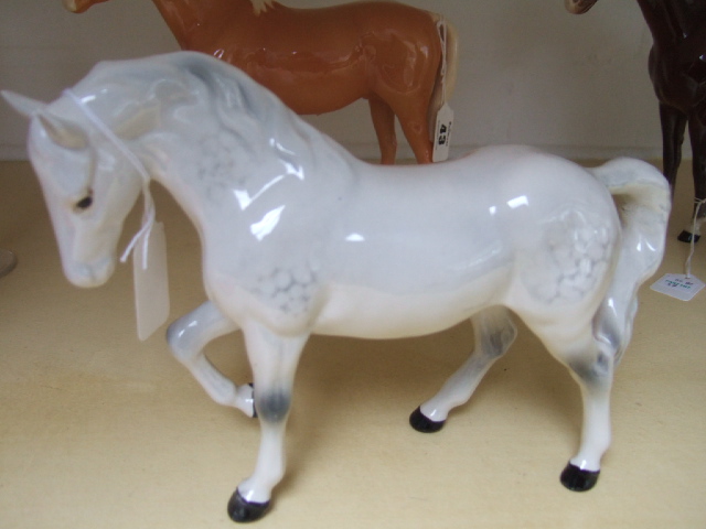 Appraisal: A Beswick horse modelled as a stocky jogging mare third