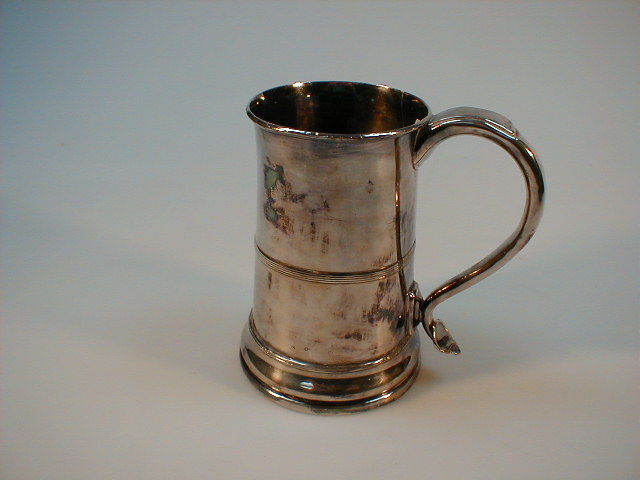 Appraisal: A Georgian Sheffield plate tapering tankard with soldered false bottom