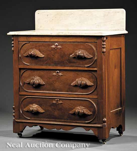 Appraisal: An American Rococo Carved Walnut Washstand mid- th c New