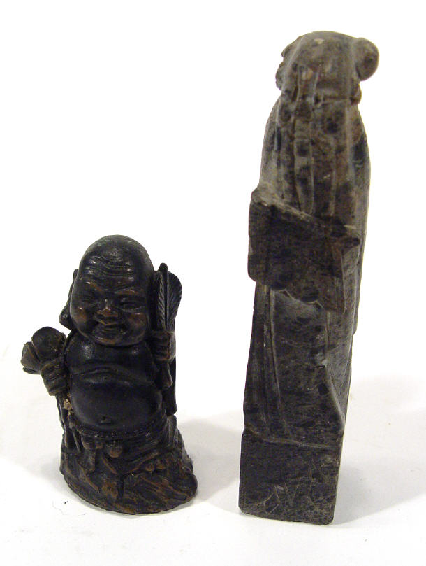 Appraisal: Oriental carved soapstone figure clutching scrolls and a wooden Oriental