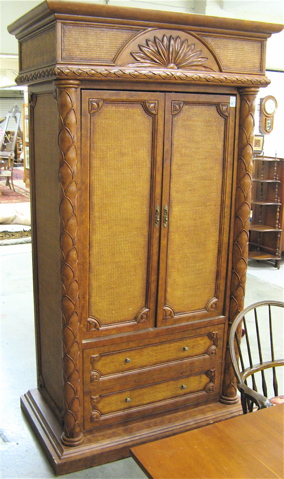 Appraisal: CONTEMPORARY ENTERTAINMENT ARMOIRE tropical design with reed paneled double doors