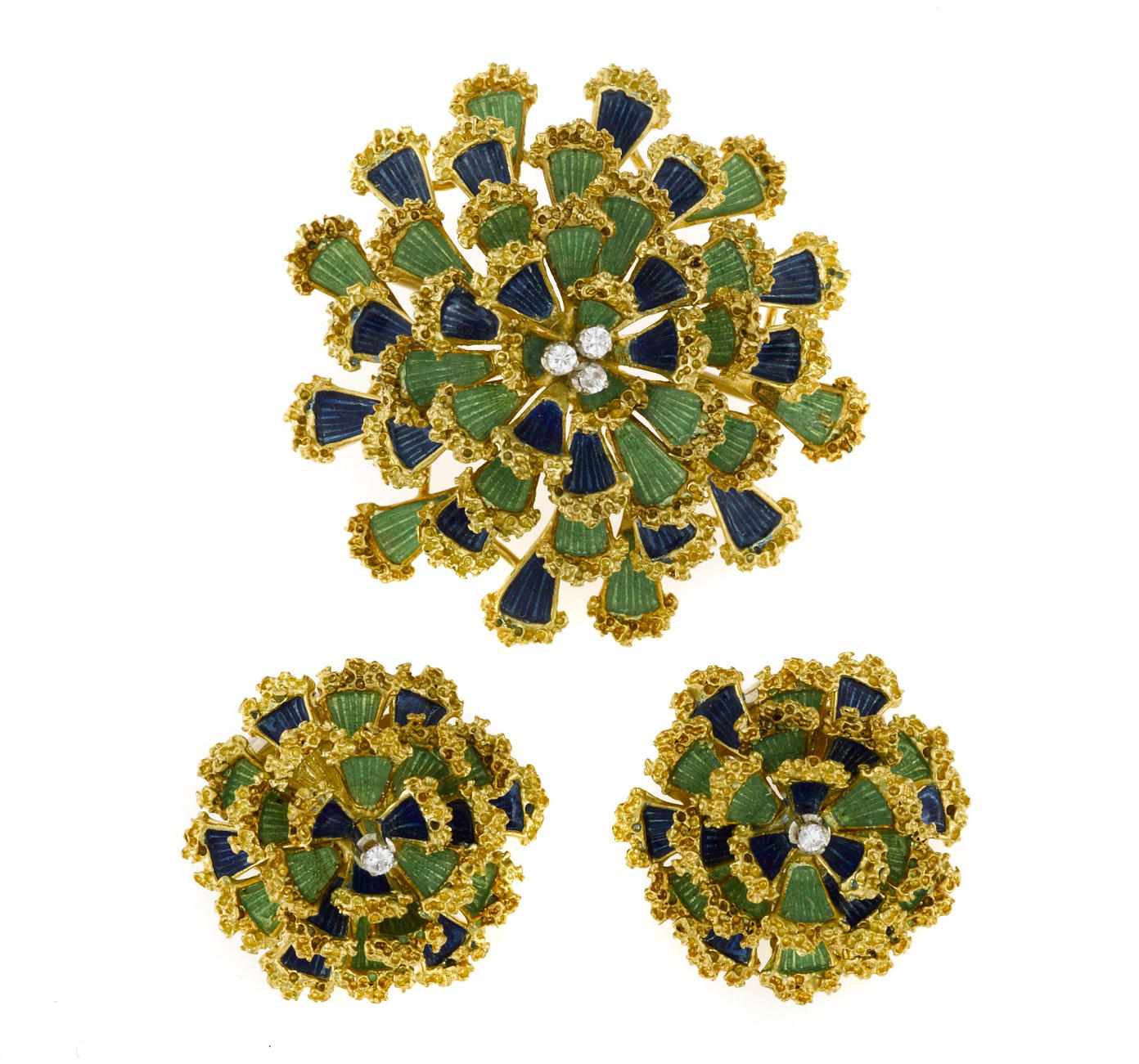 Appraisal: An enamel and diamond chrysanthemum brooch together with a matching