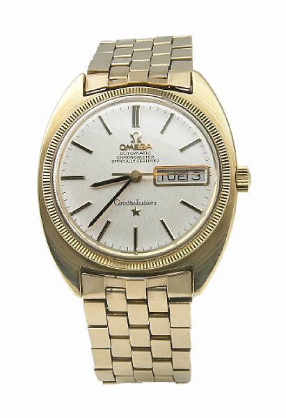 Appraisal: An k gold Omega Constellation with day and date wristwatch