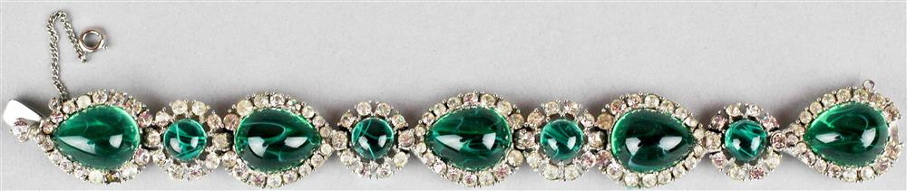 Appraisal: CINER SILVERTONE LARGE GREEN CABOCHONS WITH RHINESTONES BRACELET signed Ciner